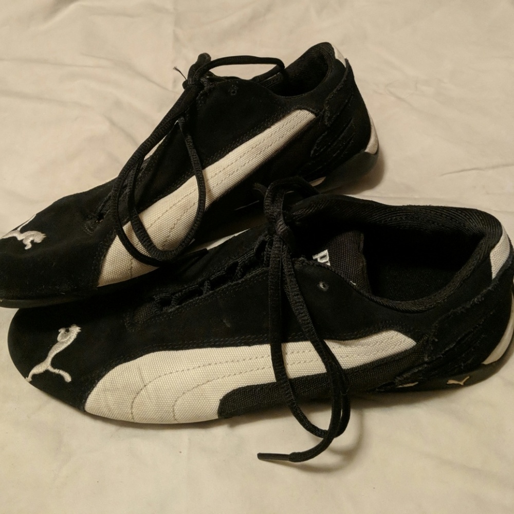 Black and white Puma sneakers